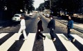 The Beatles walking across Abbey Road photo by Iain MacMillan